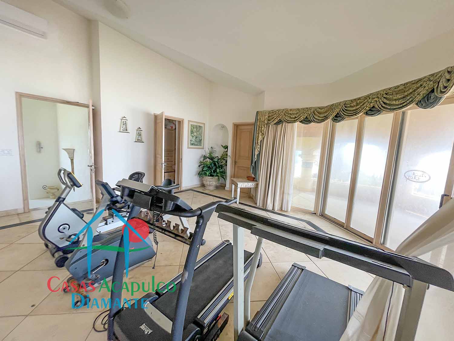 Tres Vidas Villa Universal - Sala familiar 6